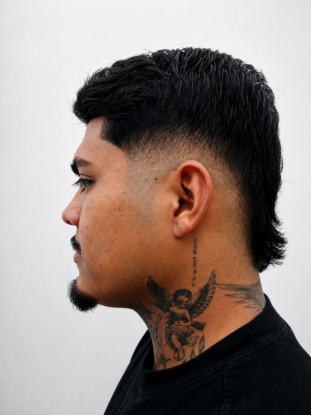 Corte fade con acabado mullet